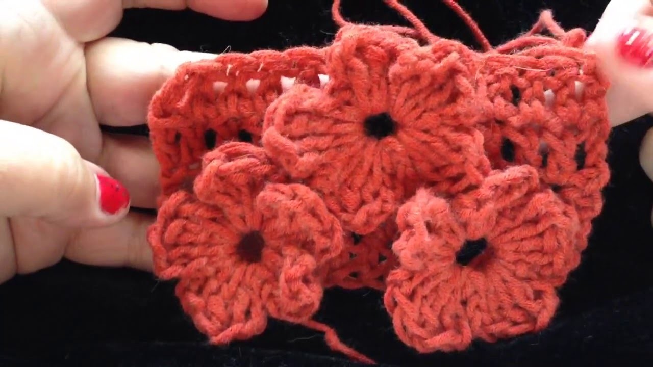 Bloem in v steek. tussen 2 stokjes haken RUSTIGE uitleg - crochet a flower in V-stitch