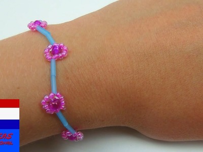 DIY bracelet. armband of ketting met bloemen maken van parels  (met parelset van Djeco)
