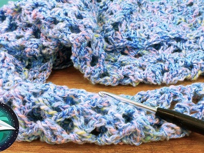 Mooi sjaaltje met netpatroon haken van licht katoen voor de zomer